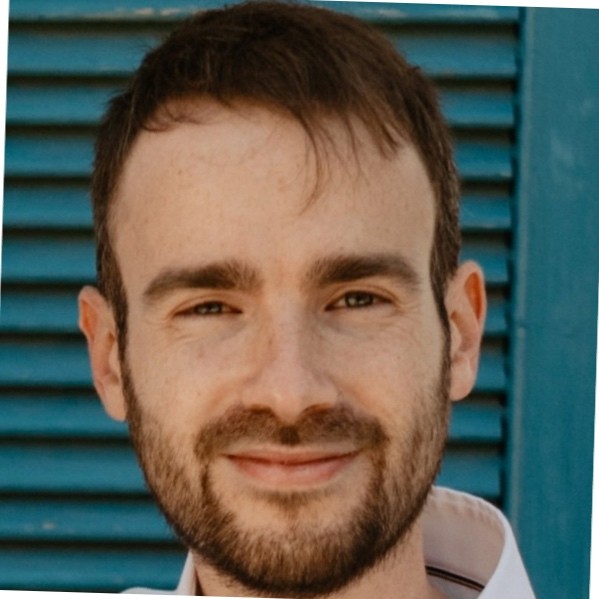 Professional headshot of Adar Hilsenrat